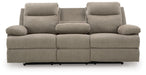 Ashley Furniture side-swipe reclining sofa with drop-down table, shown with open side, plush cushions, and modern design.
