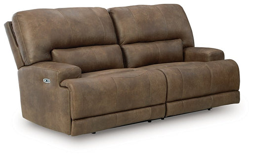 Ashley Furniture Beckley Place power reclining sofa in neutral fabric, shown from an angled view with closed recliners.