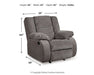 Ashley Furniture Tulen recliner in a taupe fabric, showing the plush, padded armrests and comfortable reclined position.