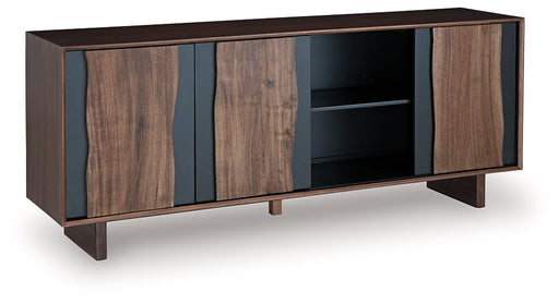 Ashley Furniture Welby Accent Cabinet showing a closed wooden cabinet with decorative hardware and a modern design.