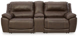 Ashley Furniture Dunleith power reclining sectional loveseat with console, showing plush fabric, built-in cup holders, and reclining features.