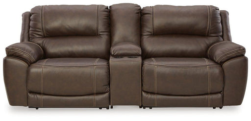 Ashley Furniture Dunleith power reclining sectional loveseat with console, showing plush fabric, built-in cup holders, and reclining features.