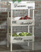 Ashley Furniture Yulton kitchen storage shelf with multiple tiers for organized kitchen or pantry storage.