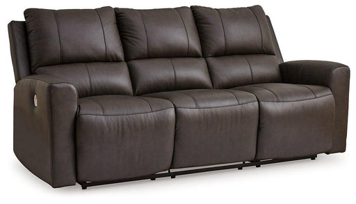Ashley Furniture Boxmere power reclining sofa with plush cushions and dark upholstery, showcasing its comfortable design.