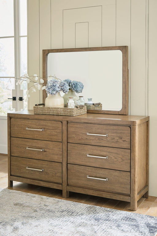 Ashley Furniture Cabalynn dresser and mirror set, featuring a stylish wooden dresser with an attached mirror for bedroom decor.