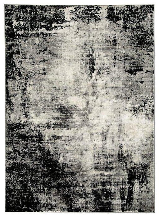 Ashley Furniture Zekeman 7'10" x 10' rug with intricate patterns in neutral tones, ideal for living room or bedroom decor.