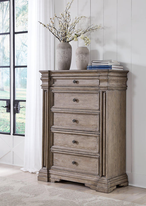 Ashley Furniture Blairhurst Chest of Drawers with a classic wooden finish and multiple storage drawers.
