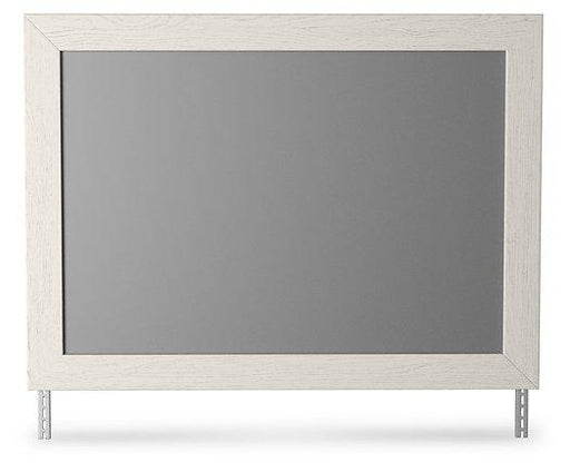 Ashley Furniture Stelsie bedroom mirror with a sleek frame, designed for stylish bedroom decor.