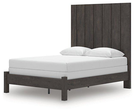 Ashley Furniture Fraluna Bed showcasing a modern wooden bed frame with a sleek design and neutral finish.