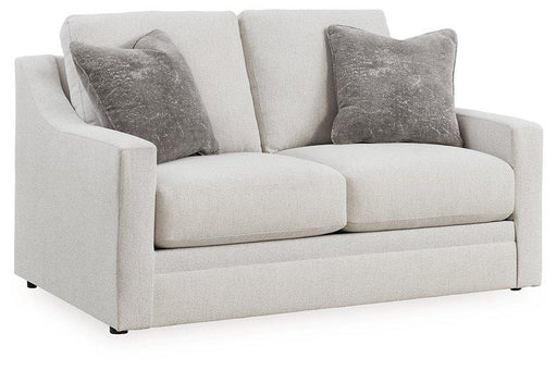 Ashley Furniture Maitelynn loveseat with plush fabric and cushioned armrests, perfect for cozy living room seating.