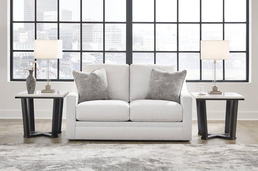 Ashley Furniture Maitelynn loveseat with plush fabric and stylish design, perfect for modern living rooms.