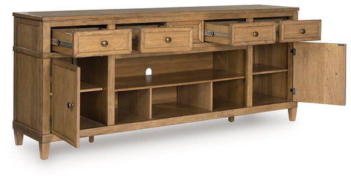 Ashley Furniture Sharlance 81-inch TV stand with open shelves and cabinets, modern wood finish for living room decor.