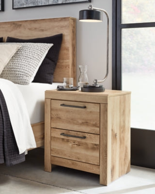 Ashley Furniture Hyanna nightstand with a dark wood finish, featuring two drawers and sleek modern handles.