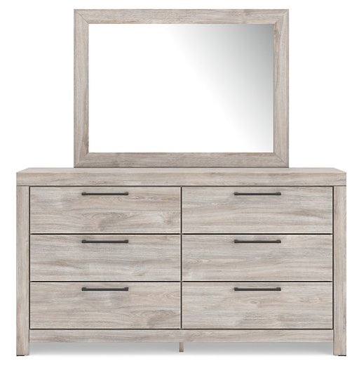 Ashley Furniture Broachmyn dresser with matching mirror, featuring a modern wood finish and sleek design, shown in head-on view.