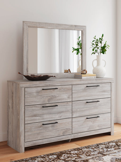 Ashley Furniture Broachmyn dresser with attached mirror, wood finish, and detailed drawer handles, showing a bedroom furniture set.