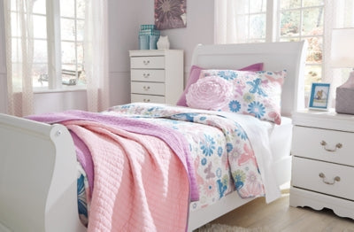 Ashley Furniture Anarasia Bed in rich wood finish with elegant design and sturdy frame, shown in a well-lit bedroom setting.