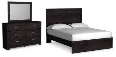 Ashley Furniture Belachime bedroom set featuring a bed, dresser, and nightstands in a stylish, coordinated design.