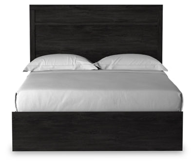 Ashley Furniture Belachime bed with a wooden headboard and elegant design, shown from a front angle.