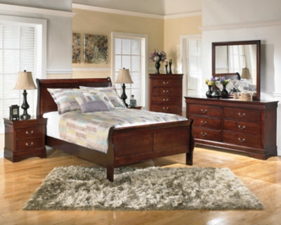 Ashley Furniture Alisdair Youth Bed with a sturdy wooden frame and classic design, perfect for a child's bedroom.