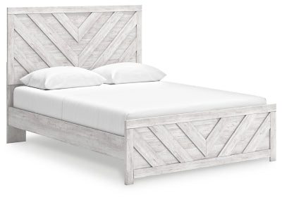 Ashley Furniture Cayboni Bed with dark wood finish, shown from a side angle, featuring a modern design with clean lines.