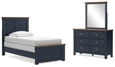 Ashley Furniture Landocken bedroom set with a bed, nightstands, and dresser in a modern bedroom interior.