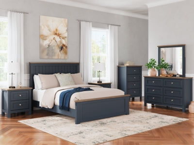 Ashley Furniture Landocken bedroom set with a modern bed, matching nightstands, and stylish bedroom furniture in a cozy room setting.