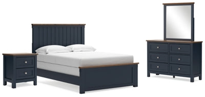 Ashley Furniture Landocken bedroom set includes a bed, nightstands, and dresser in a stylish bedroom package.