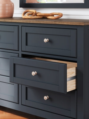 Ashley Furniture Landocken bedroom set with a stylish bed frame, matching nightstands, and coordinated bedroom decor.