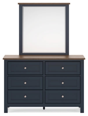 Ashley Furniture Landocken bedroom set with a modern bed, matching nightstands, and elegant decor in a stylish bedroom scene.