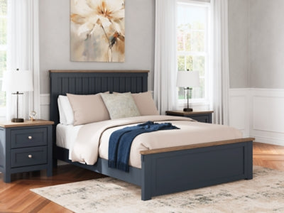 Ashley Furniture Landocken Bedroom Set with bed frame, nightstands, and dresser in a modern bedroom design.