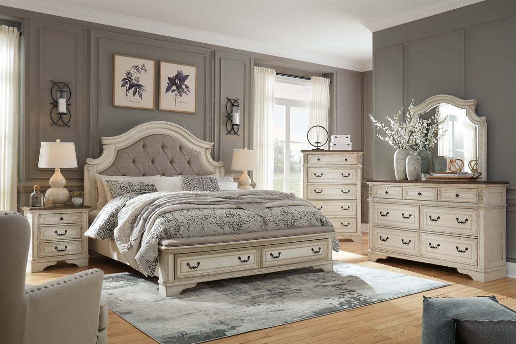 Ashley Furniture Realyn bedroom set featuring a bed, nightstands, and dresser with elegant wood finish and classic design.