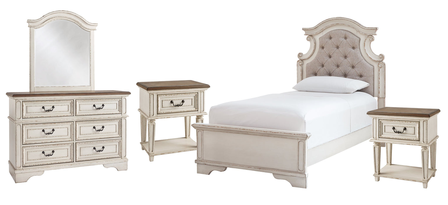 Ashley Furniture Realyn bedroom set featuring a bed with a plush headboard, matching nightstands, and coordinated bedroom decor.