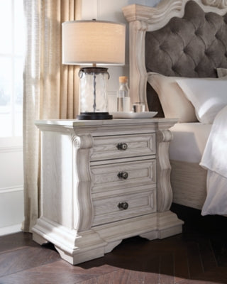 Ashley Furniture Bruchandi bedroom set featuring a bed frame, nightstands, and matching dresser in a modern design.