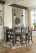 Set of Ashley Furniture Caitbrook counter height barstools with wooden legs and cushioned seats, part of the dining package.