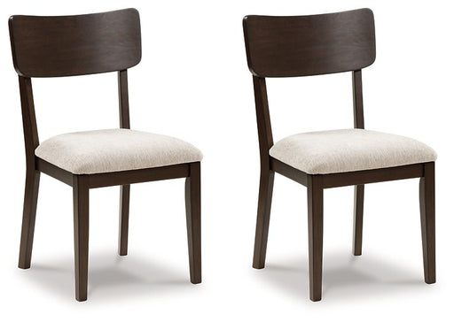 Ashley Furniture Mallenette dining chair with upholstered seat and wooden legs, shown from an angled view.