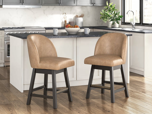Set of two Neymorton counter height barstools by Ashley Furniture with dark wood finish and cushioned seats.