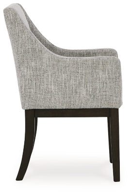 Ashley Furniture Burkhaus dining room set with a wooden table and chairs, shown from a side view in a modern dining room setting.