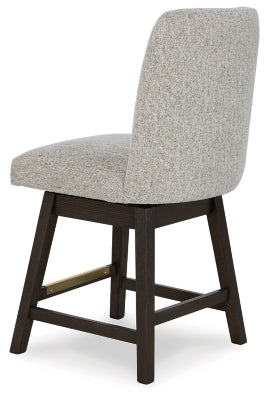 Elegant Ashley Furniture dining room set with a large table and matching chairs, viewed from an angled back perspective.