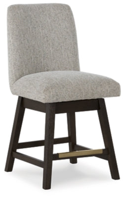 Ashley Furniture Burkhaus dining room set with a table and chairs, shown from an angled view in a modern dining space.