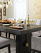 Ashley Furniture Burkhaus dining room set with a polished wooden table and matching chairs, detailed close-up of the tabletop.