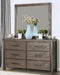 Rexburg Wire-Brushed Rustic Brown Dresser image