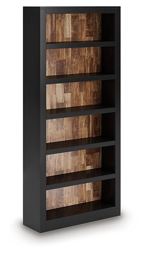 Wildenauer 75-inch wooden bookcase by Ashley Furniture, angled view showing multiple spacious shelves for storage and display.