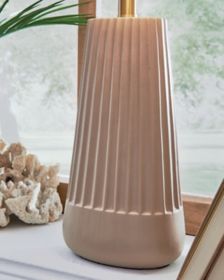 Ashley Furniture Dellner table lamp with a sleek base and fabric shade, ideal for modern living room or bedroom decor.