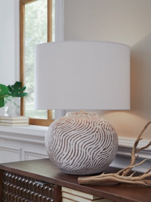 Ashley Furniture Vien table lamp with a sleek ceramic base and fabric shade, ideal for modern living room or bedroom decor.