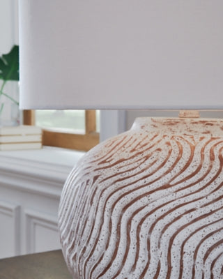 Ashley Furniture Vien table lamp with a sleek base and fabric shade, ideal for modern living room or bedroom decor.