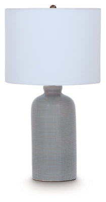 Ashley Furniture Wimlow table lamp with a beige fabric shade and wooden base, ideal for bedroom or living room decor.