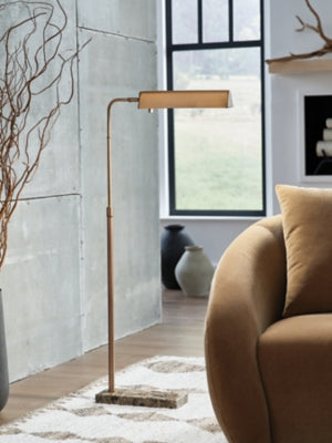 Ashley Furniture Yafe Floor Lamp with tall, sleek design and fabric shade, ideal for modern living room lighting.