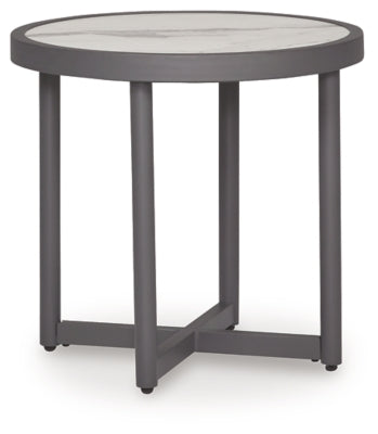 Ashley Furniture Ocean Beach outdoor end table with a natural wood finish, featuring a simple square design for patio decor.