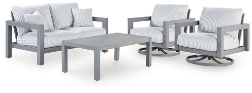 Outdoor table set from the Hurley Park collection by Ashley Furniture, includes a table and chairs in a stylish outdoor design.