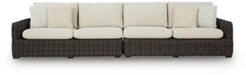 Ashley Furniture Kimora outdoor sectional with beige cushions and dark wicker frame, designed for stylish outdoor seating.